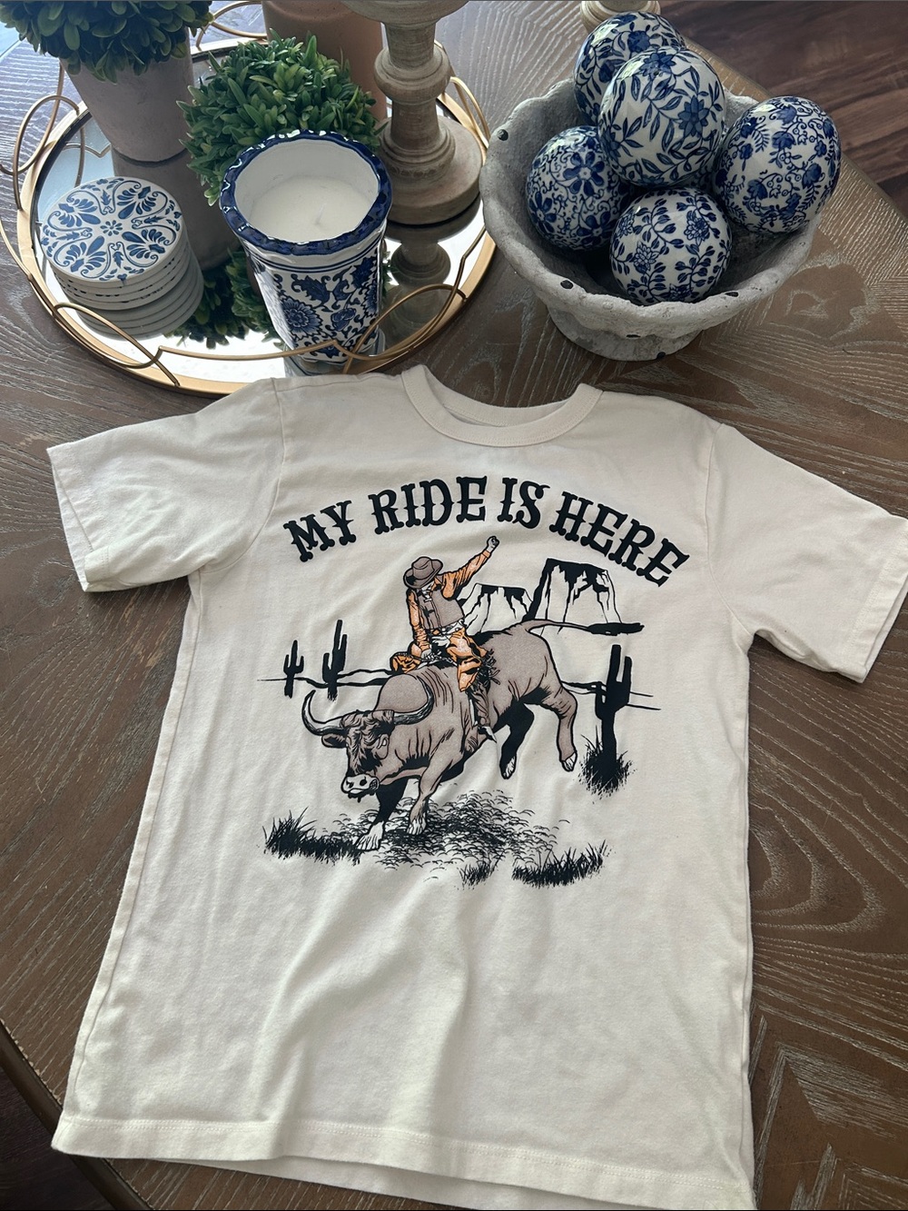 My Ride Is Here Western Cowboy Rodeo Graphic Kids T‑Shirt - Cream Medium